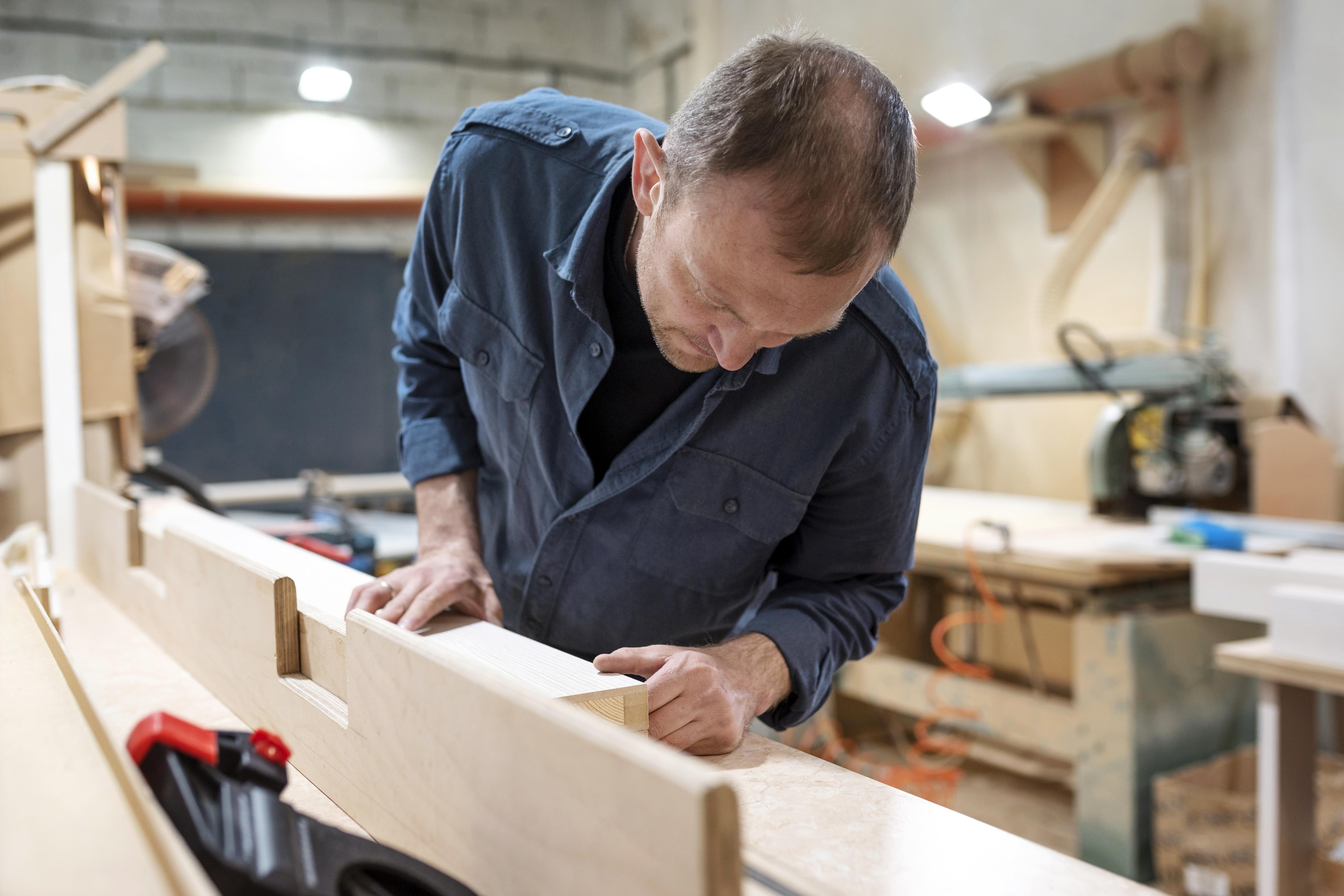 man-working-wood-workshop